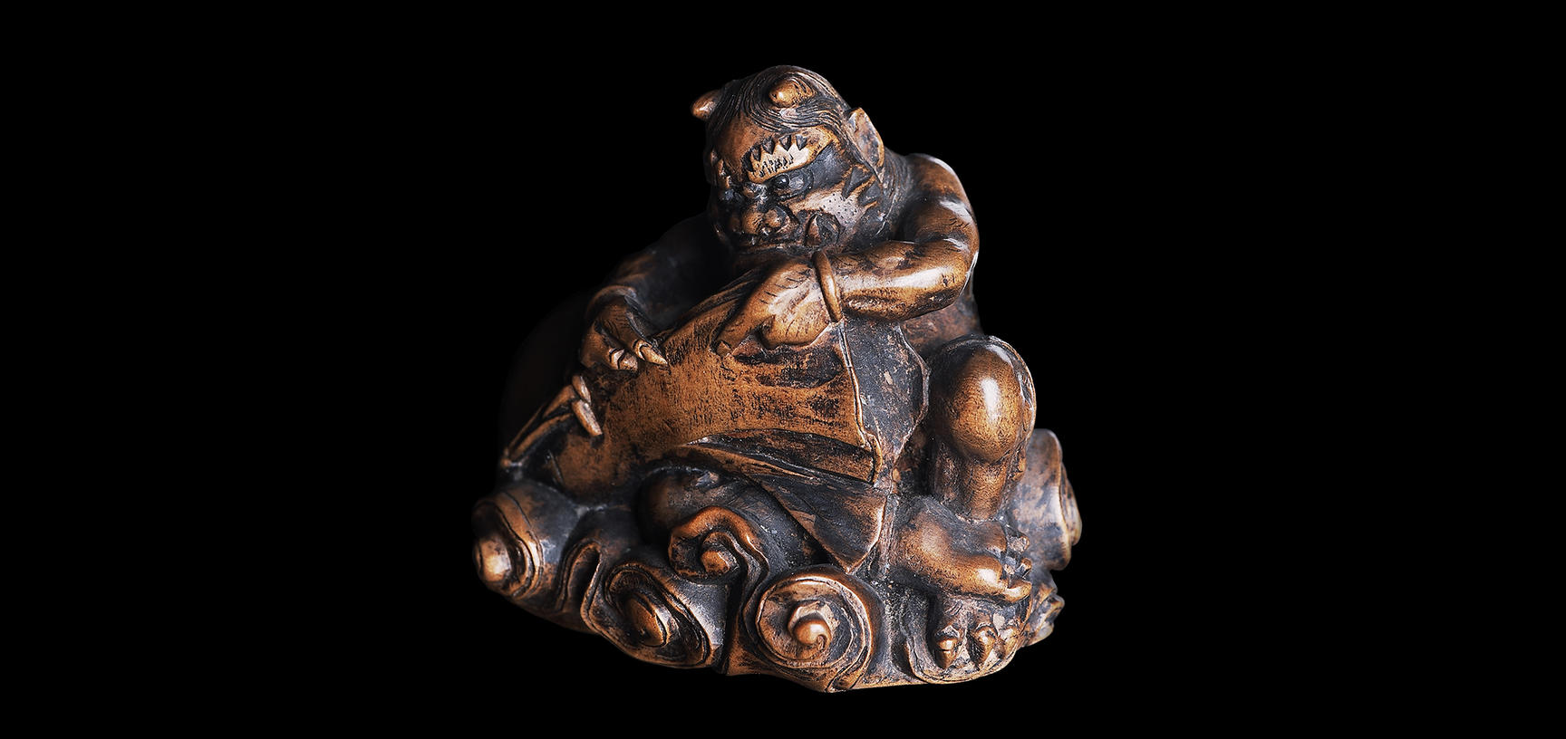fujin the wind god releasing winds from his sack wood 1840 1877 ashmolean museum