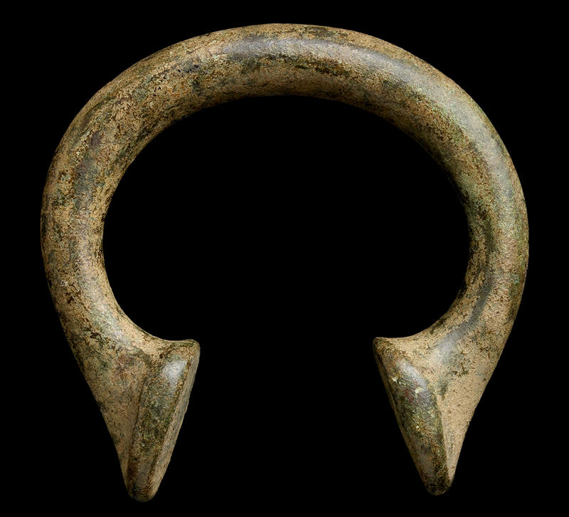 A ‘Manilla’ – pre-colonial money in West Africa, brass, HCR6515 A horseshoe-shaped brass ‘Manilla’ – pre-colonial money in West Africa